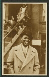 Bill Robinson on street in Harlem