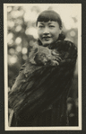 Anna May Wong holding baby koala