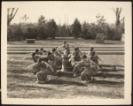 Dancers around water pedestal