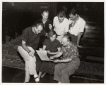 1952 Music Period, group looking at score