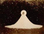 Loie Fuller in wide cape