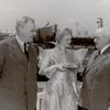 General Motors - Miss Futurama presenting model 1960s car to Harvey Gibson