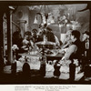 Anna May Wong in background with unidentified actors in foreground in the motion picture Limehouse Blues [aka Limehouse Nights]