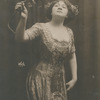 Sophie Tucker holding a rose, at the American Music Hall.
