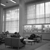 Donnell Library. Three librarians around table