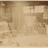 Plaster workshop : men working on models, including a Corinthian capital