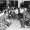 Work with schools, Aguilar Branch : Italian boys listening to the story of Pinocchio in Italian