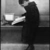 Fordham, boy reading on bench