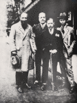 Ansermet, Diaghilev, Stravinsky and Prokofiev on sidewalk.
