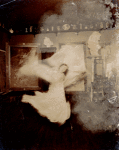Loie Fuller as blurred figure in room