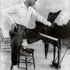 Nijinsky studying a piano score.