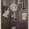 Boy holding a candle