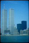 Skyline of lower Manhattan with Twin Towers at left.