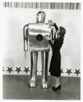 Westinghouse - Mechanical Man and Dog (Elektro and Sparko) - Woman showing roses to Elektro