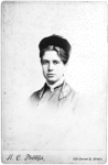 Portrait Florence Kelley with hat on.