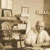 Samuel T. Clover at his desk in Los Angeles