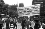 Men holding Christopher Street Liberation Day banner, 1970