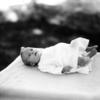 Nora Sayre as baby (feet raised)