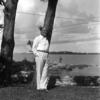Joel Sayre standing by tree in Bermuda