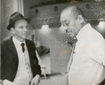 Medium shot of Sy Oliver and Frank Sinatra