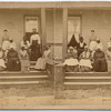 Group of elderly people on porch.
