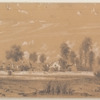 Field in foreground, houses and trees in background