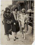 Three members of the Northeasterners, Inc., Edith Scott, Louise Swain, and Helene Corbin on Seventh Avenue in Harlem.