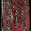 Front cover: red velvet with silver repoussé of Jesus on the cross with the Virgin Mary at left and St. John at right and busts of the four Evangelists in each corner