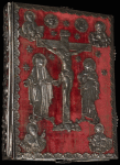 Front cover: red velvet with silver repoussé of Jesus on the cross with the Virgin Mary at left and St. John at right and busts of the four Evangelists in each corner