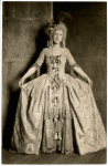 Agnes Morgan as Mistress Scandal dressed in a ball gown in Island Street Follies