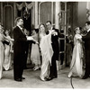 Julie Andrews and Rex Harrison (center) and cast in the stage production My Fair Lady.