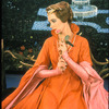 Julie Andrews holding a rose in Camelot