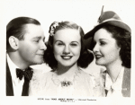 Publicity photo of Herbert Marshall, Deanna Durbin, and Gail Patrick in the motion picture Mad About Music.