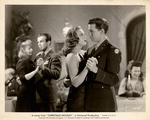 Deanna Durbin and Dean Harens (foreground) in the motion picture Christmas Holiday.