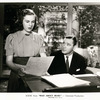 Deanna Durbin and Herbert Marshall in the motion picture Mad About Music