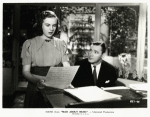 Deanna Durbin and Herbert Marshall in the motion picture Mad About Music.