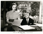 Deanna Durbin and Herbert Marshall in the motion picture Mad About Music