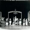 Ula Sharon and Carl Randall (center stage) in the "Alice in Wonderland" scene in the stage production Music Box Revue.