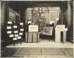 Display of posters, signs, and props to promote a performance by Harry Houdini at the Salem Theatre, Salem, Mass