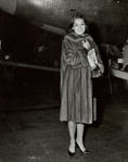 Candid photo of Nancy Kwan promoting the motion picture The World of Suzie Wong.