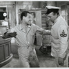 William Holden and unidentified actor in the motion picture The World of Suzie Wong