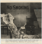 Alla Nazimova smoking off-stage during the the motion picture Madame Peacock