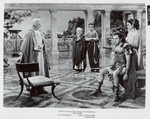 Unidentified actors, Richard Burton, and Jean Simmons in the motion picture The Robe.