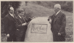 Jack L. Warner, unidentified boy and unidentified man standing near Mount-Warner rock.