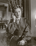 Alexis Smith in the motion picture Any Number Can Play.