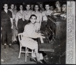Irving Berlin entertains WACs [Women's Army Corps] in New Guinea.