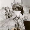 Helen Hayes, CBS star, drops her book and just takes it easy in the living room of her decorative Victorian home in Nyack, N.Y.