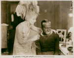 The May McAvoy and Al Jolson in the motion picture The Jazz Singer.