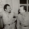 Moss Hart confers with Major Maurice Evans regarding the stage production The Man Who Came to Dinner
