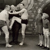 George M. Cohan with acrobats and unidentified child actors in the stage production I'd Rather Be Right.